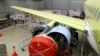 Assembling a Sukhoi Superjet 100 passenger plane at aircraft factory